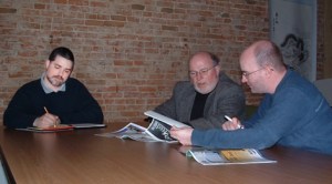 The management team of Grain & Feed Marketing making plans for the Summer issue. Pictured are (left to right) Christopher Clukey, Floyd K. Roberts and Ben Luedtke.